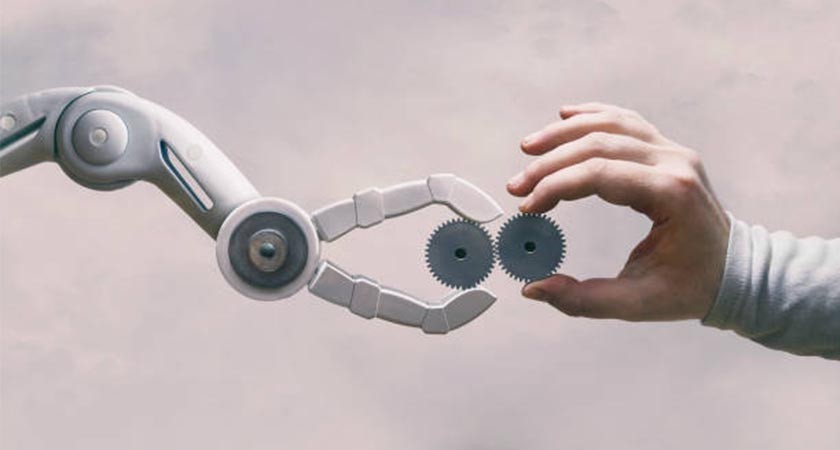 ruka-robota-i-ruka-cheloveka-sopostavlyayut-detali